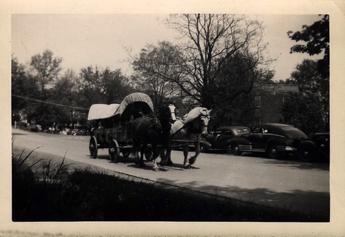Covered wagon on Main Street in 100th Hambletonian Anniversary Parade, May 5, 1949. chs-003486